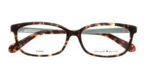 Kate Spade - Jazmine [Yellow Tortoise]. Features preppy vintage shape in handmade acetate with the phrase, “boys make passes at girls in glasses” on the inside arm, and Kate Spade logo.